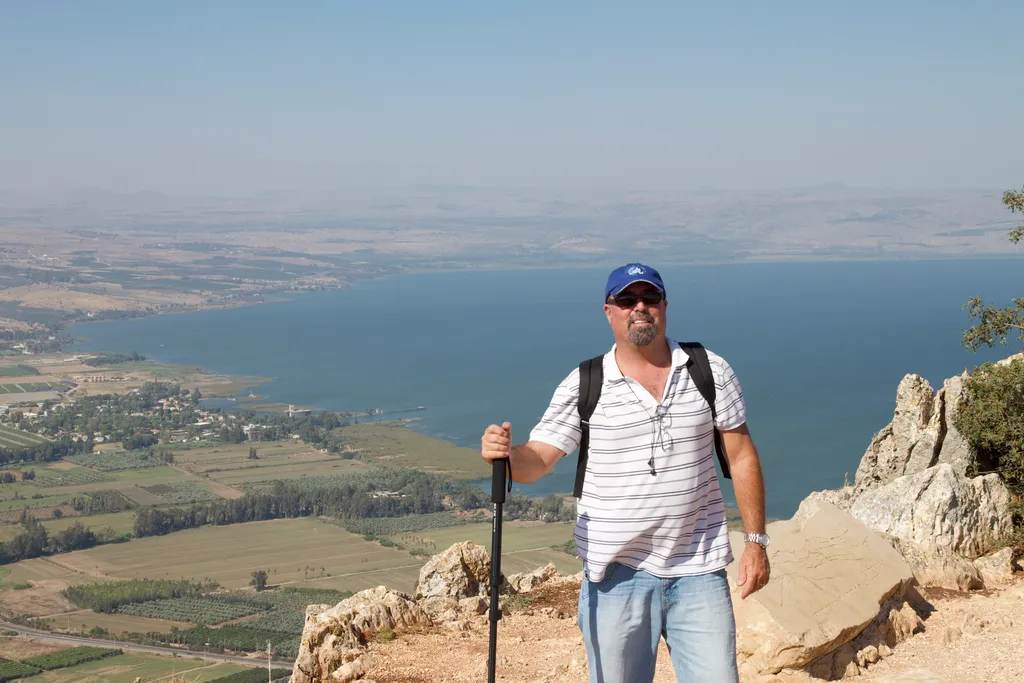 Ted Litwiller on Top of Mt. Arbel with the Galilee and Sea of Galilee in Background