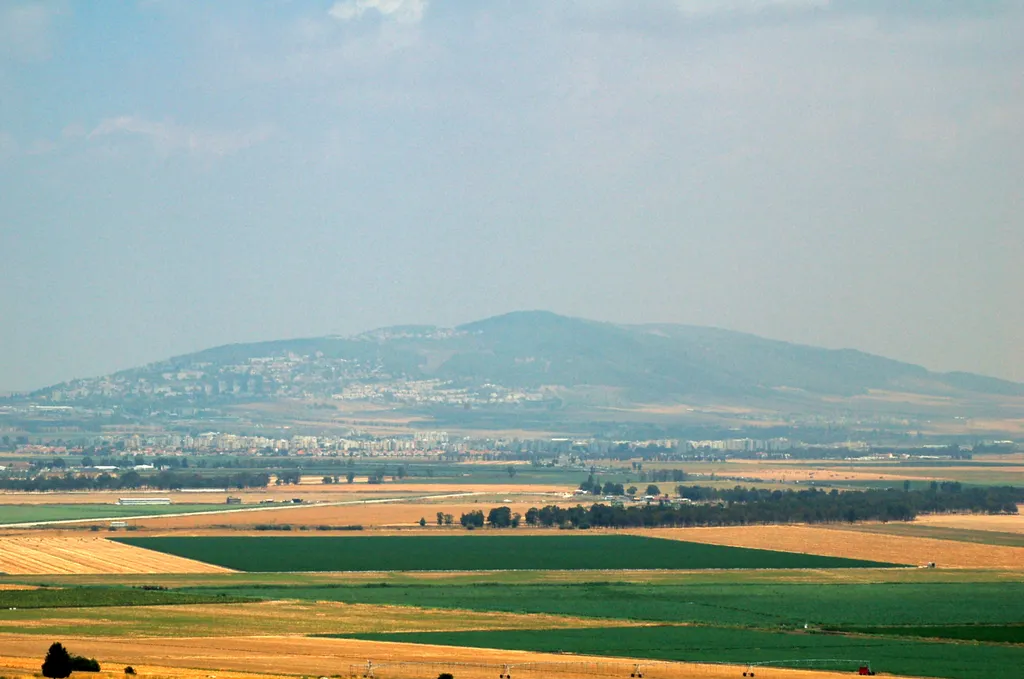 Nazareth on hill across Valley of Jezreel from Tel Megiddo
